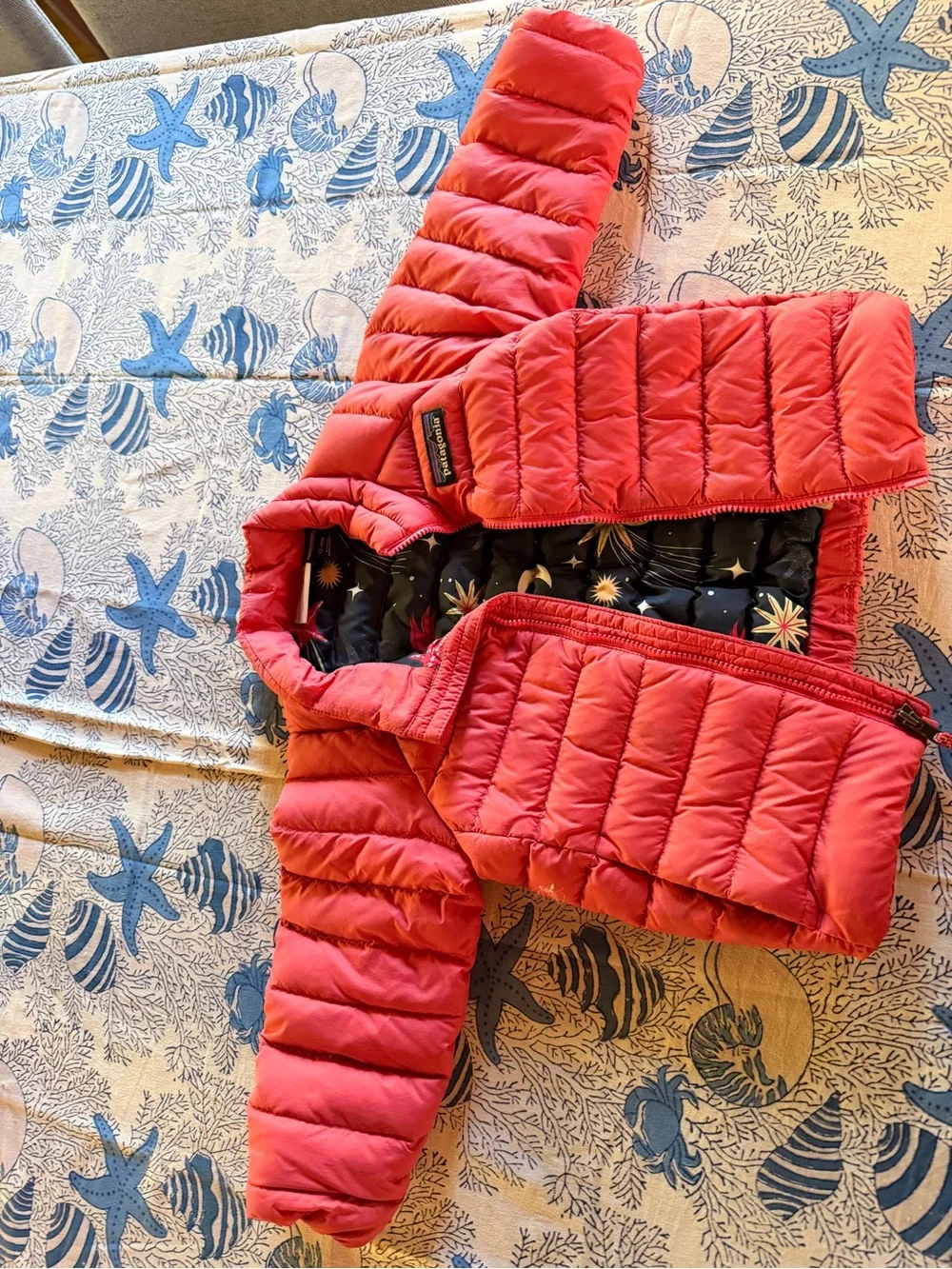 Patagonia Kids Coral Pink Puffer Jacket with Navy Starfish Lining